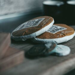 Compressed pu-erh tea cakes wrapped in paper