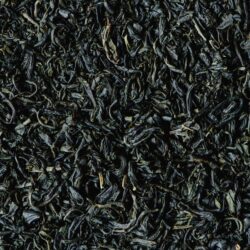 Close-up of dark, curled dried black tea leaves
