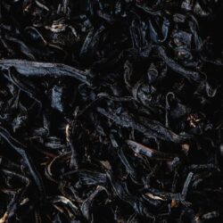 Whole, unbroken black tea leaves typical of the OP (Orange Pekoe) grade