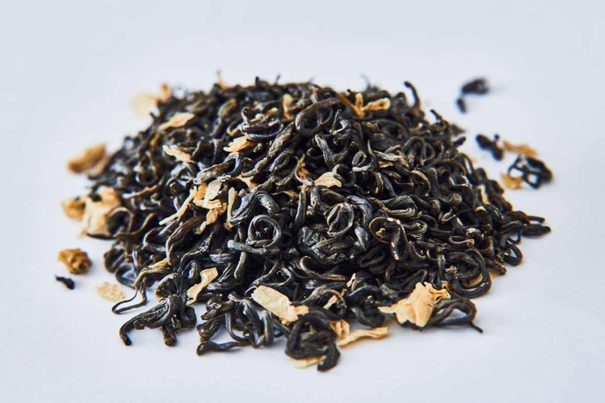 Whole-leaf black tea with visible golden tip buds, characteristic of tippy golden flowery orange pekoe (TGFOP) grade