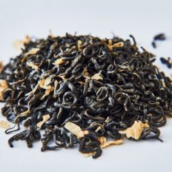 Whole-leaf black tea with visible golden tip buds, characteristic of tippy golden flowery orange pekoe (TGFOP) grade