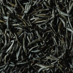 Pile of downy silver-white tea buds, close-up