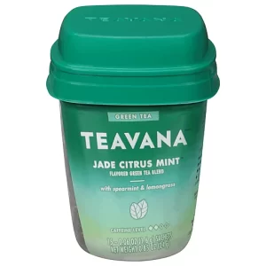 A container of Teavana Jade Citrus Mint green tea, featuring a green gradient design with white text. The label highlights it as a flavored green tea blend with spearmint and lemongrass, showing its caffeine level and net weight of 0.85 oz (24 g).