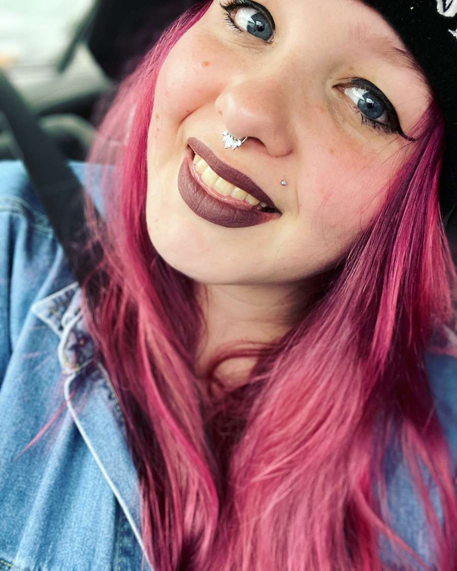 Nora Eagan, Moody Teas co-founder, with vibrant pink hair — bringing bold vibes & affordable loose leaf tea.
