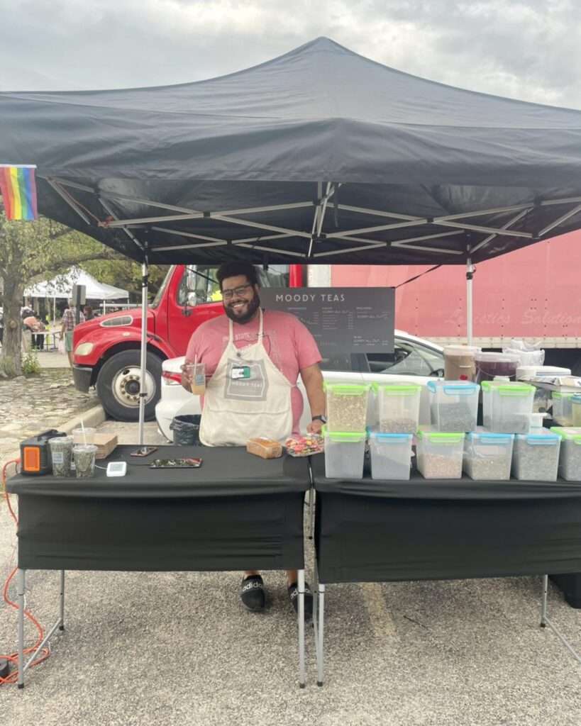 John Nelson, Moody Teas co-founder, at Lincoln Park Farmers Market sharing affordable, mood-boosting loose leaf tea.